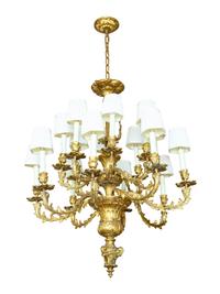 A Louis XV Style Gilt Bronze Sixteen-Light Chandelier