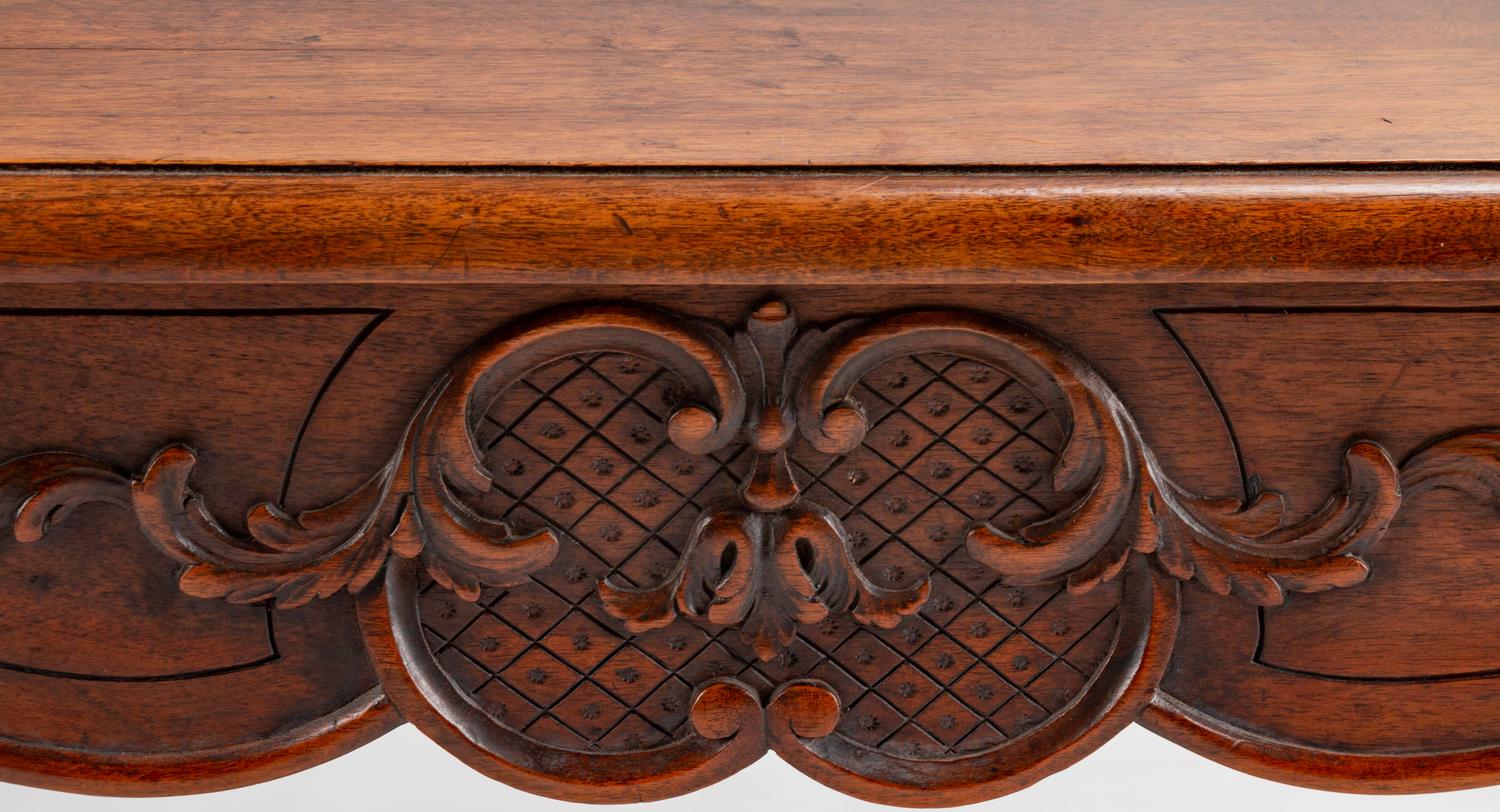 A Louis XV Style Carved Walnut Table — 19TH CENTURY