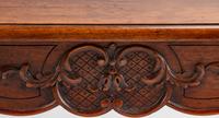 A Louis XV Style Carved Walnut Table — 19TH CENTURY
