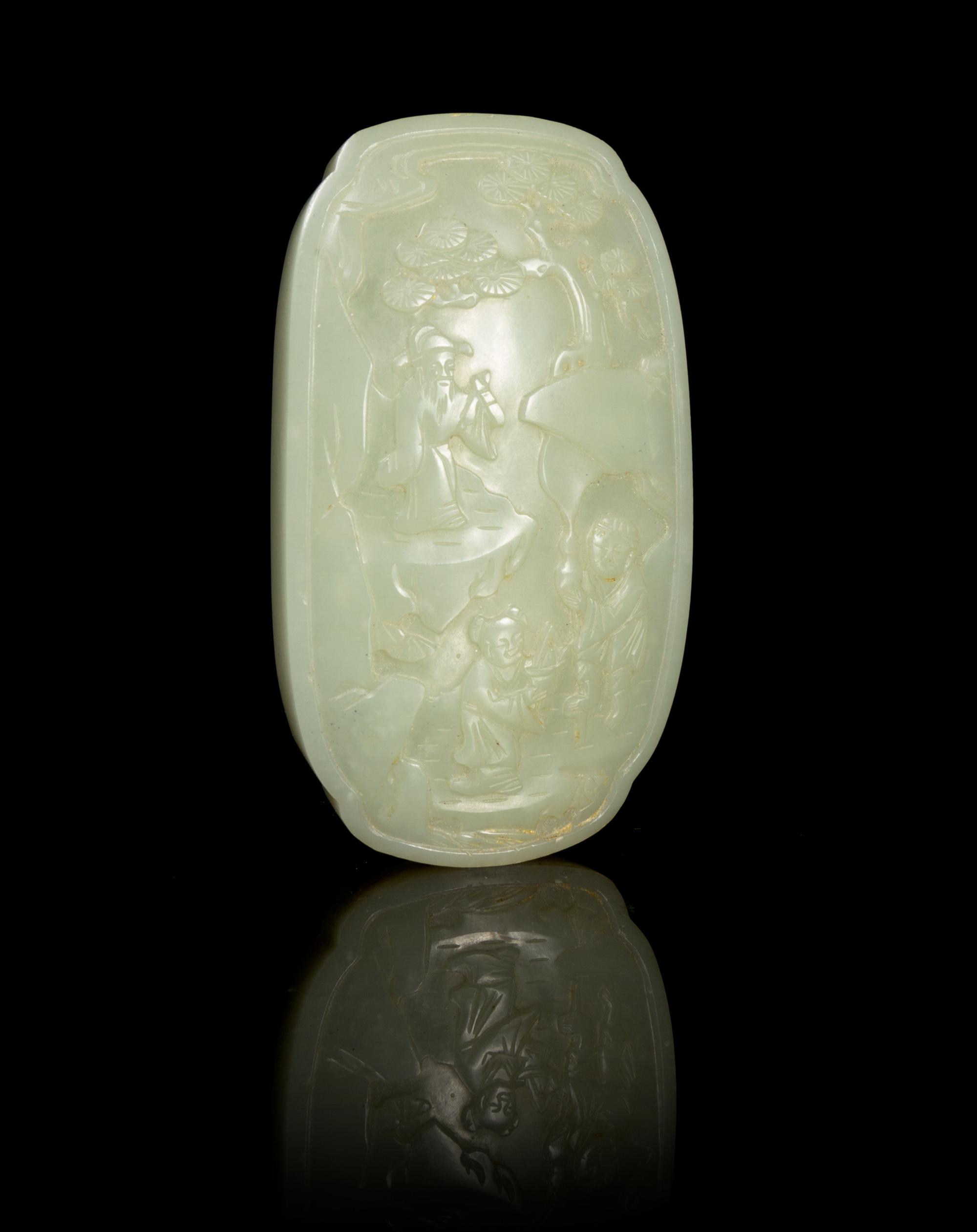 A Carved Celadon Jade Plaque Height 4 1/8 inches.
