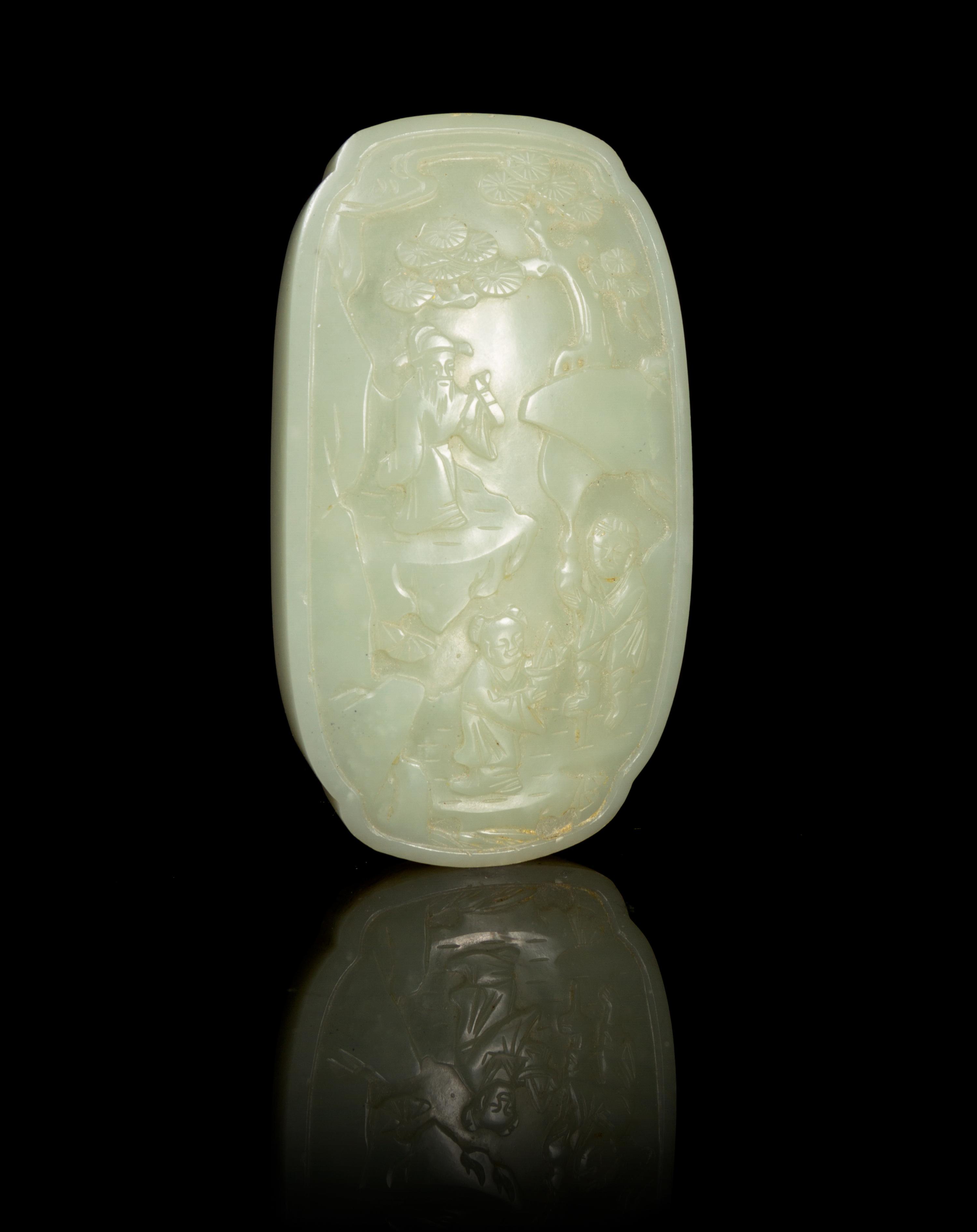 A Carved Celadon Jade Plaque Height 4 1/8 inches.