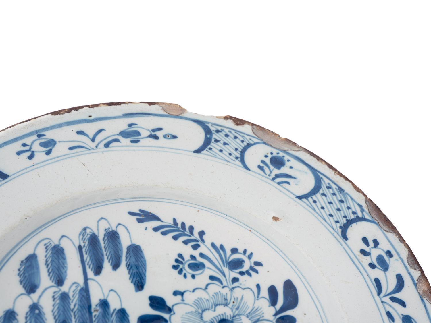 A Dutch Blue and White Glazed Delftware Charger