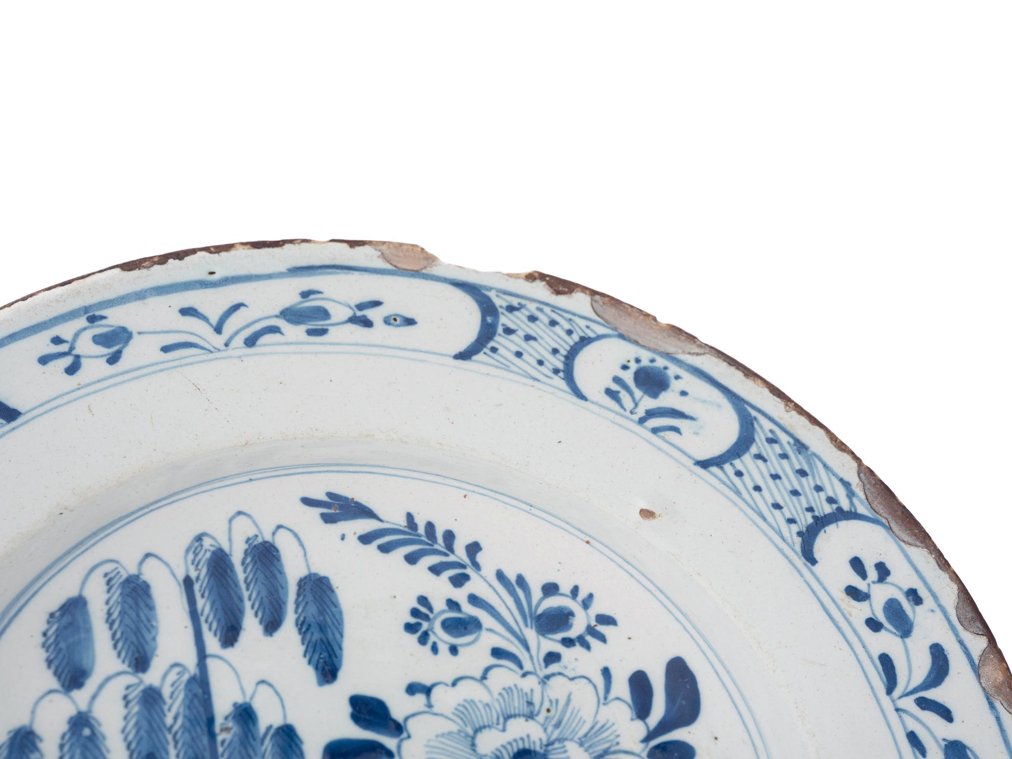 A Dutch Blue and White Glazed Delftware Charger