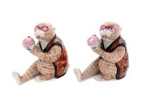 A Pair of Mottahedeh Porcelain Monkey Figures