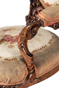 A Pair of Rococo Revival Carved Rosewood Armchairs