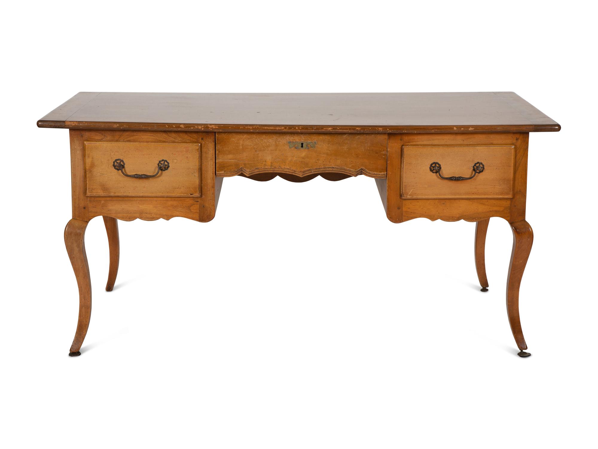 A Louis XV Provincial Style Fruitwood Writing Table