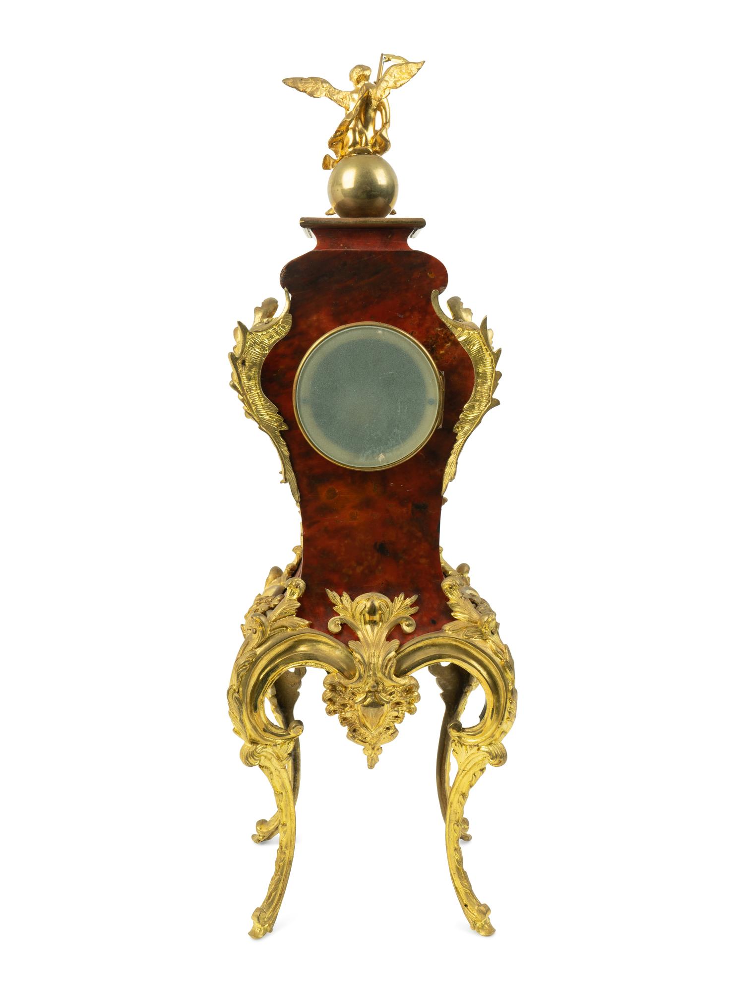 A French Gilt Bronze Mounted Tortoiseshell Veneered Clock — 19TH CENTURY