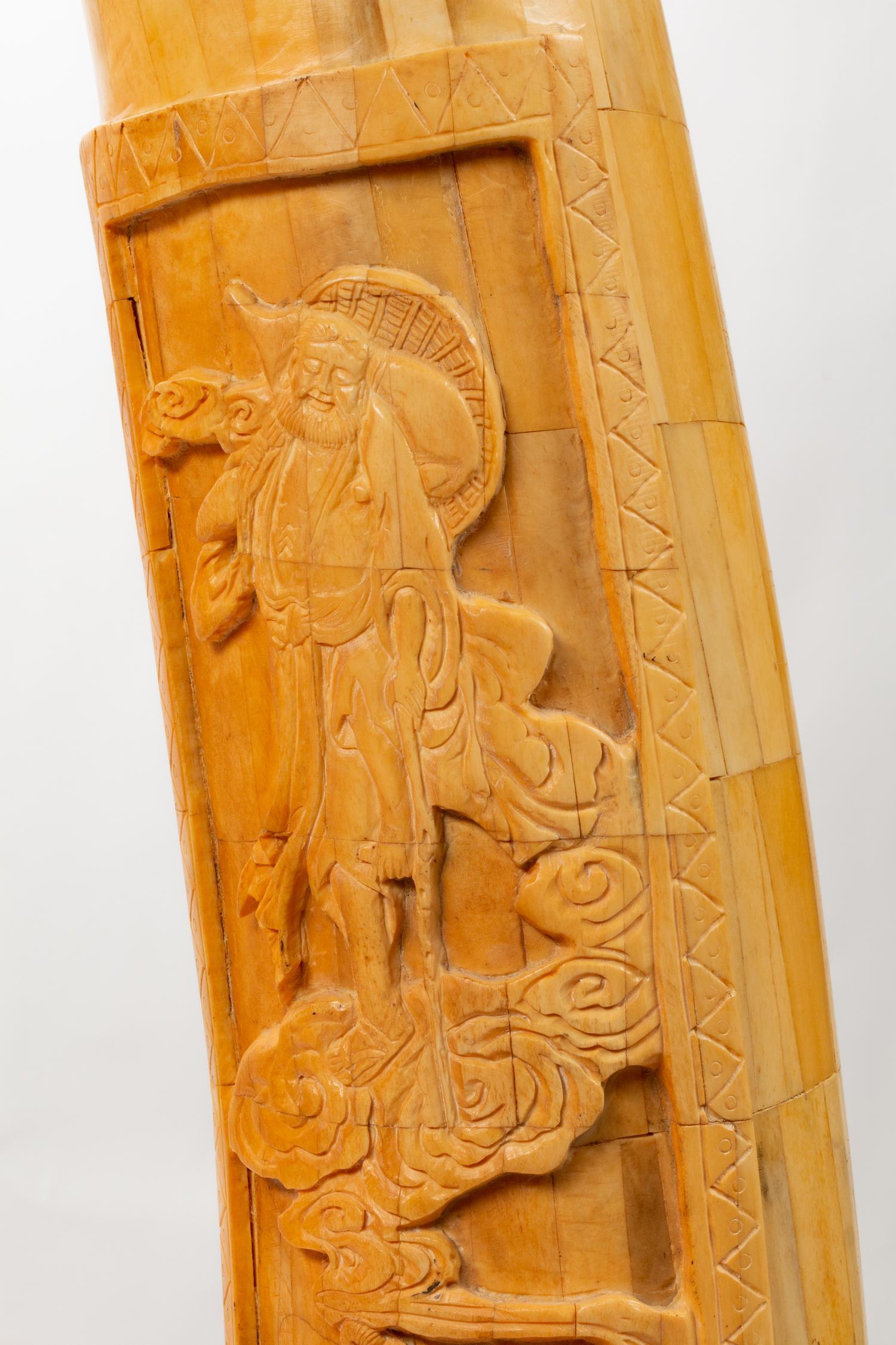 A Pair of Chinese Export Carved Bone Tusks with Wood Bases