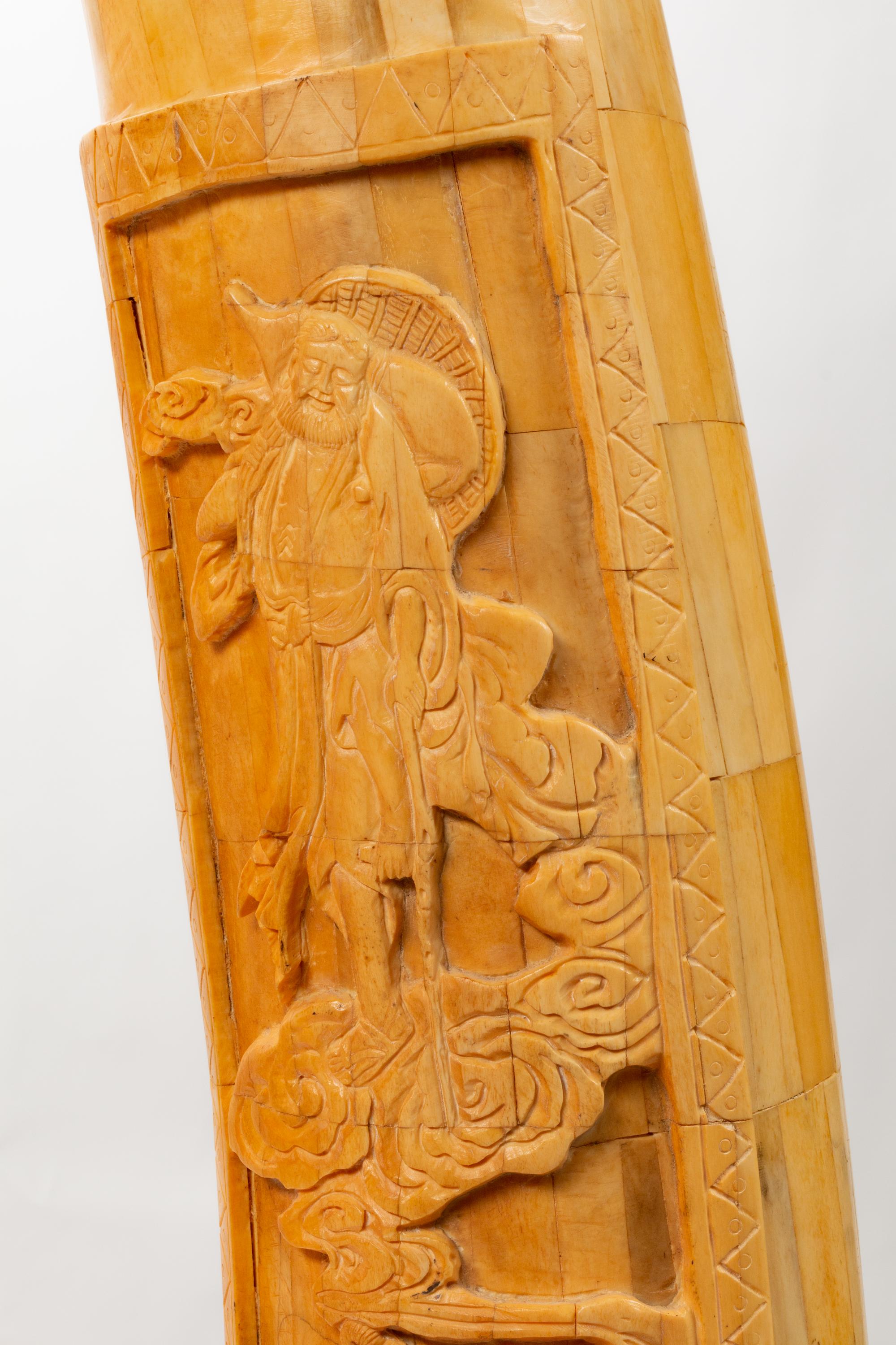 A Pair of Chinese Export Carved Bone Tusks with Wood Bases
