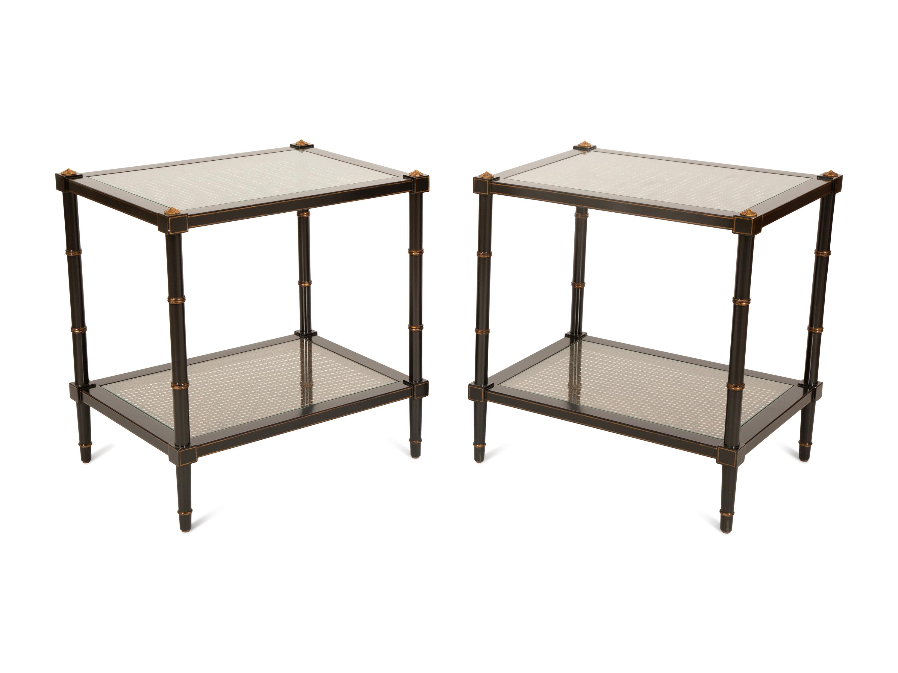 A Pair of Regency Style Ebonized and Gilt Decorated Side Tables
