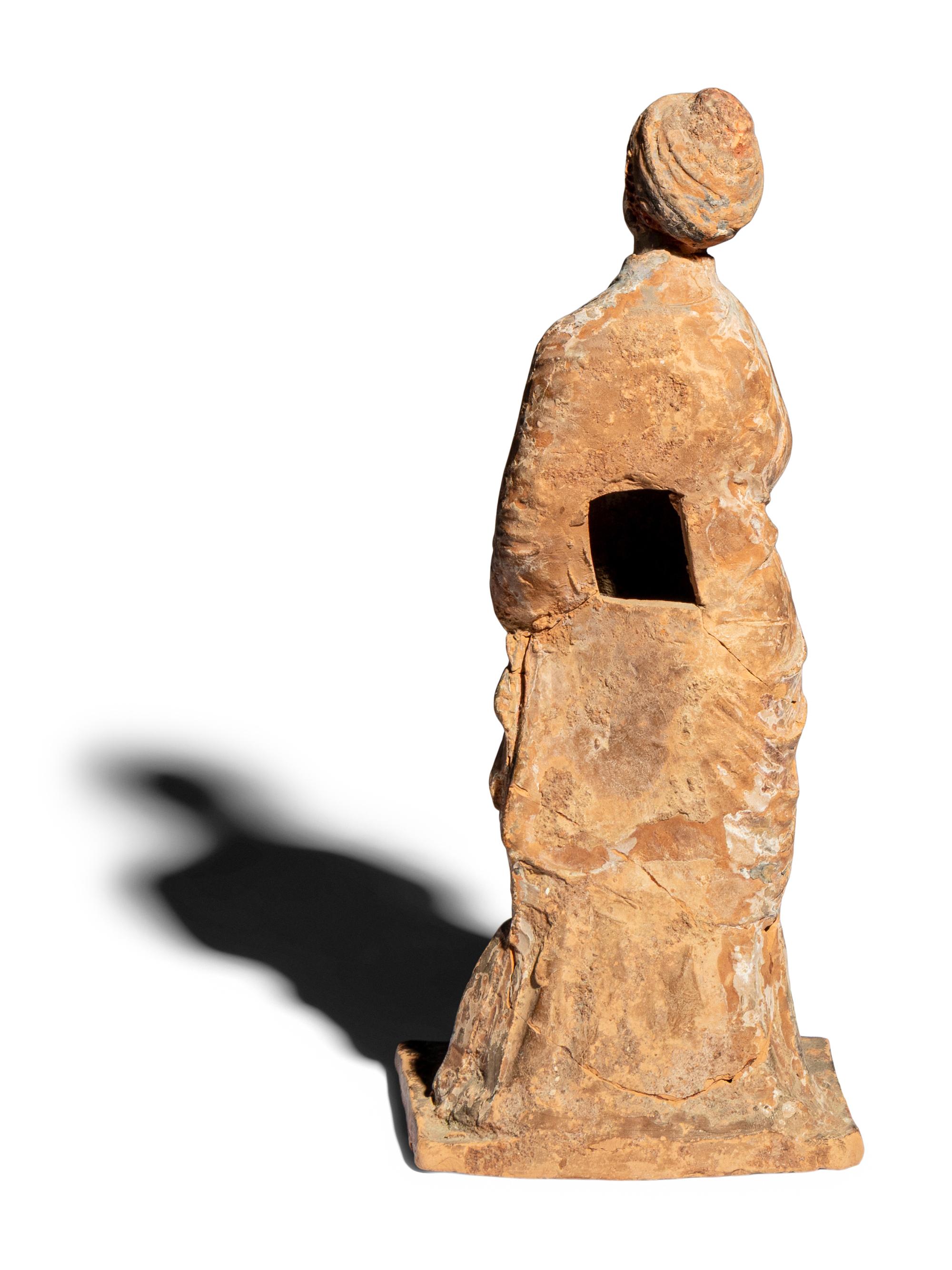 A Neoclassical Terracotta Tanagra Figure