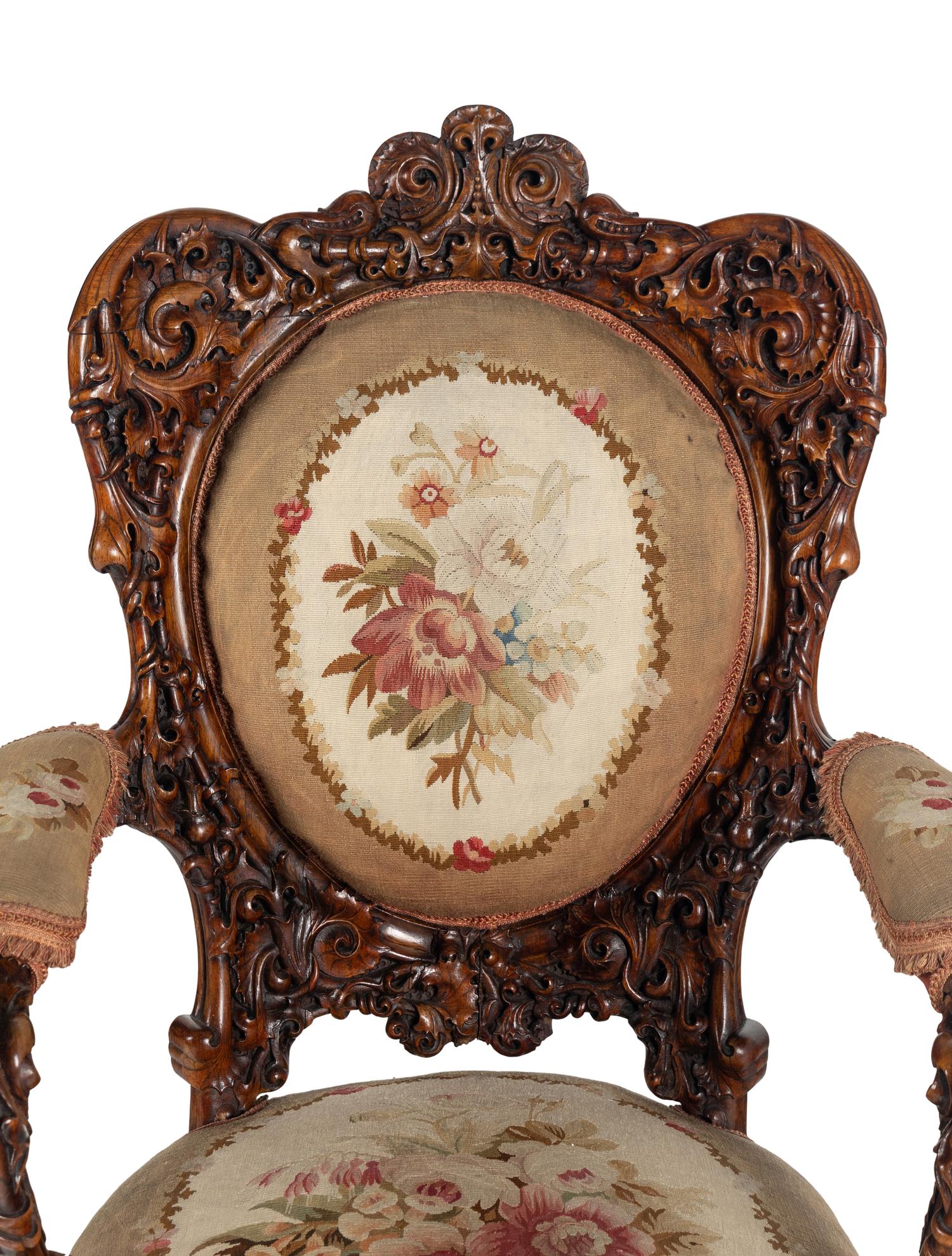 A Pair of Rococo Revival Carved Rosewood Armchairs