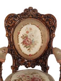 A Pair of Rococo Revival Carved Rosewood Armchairs