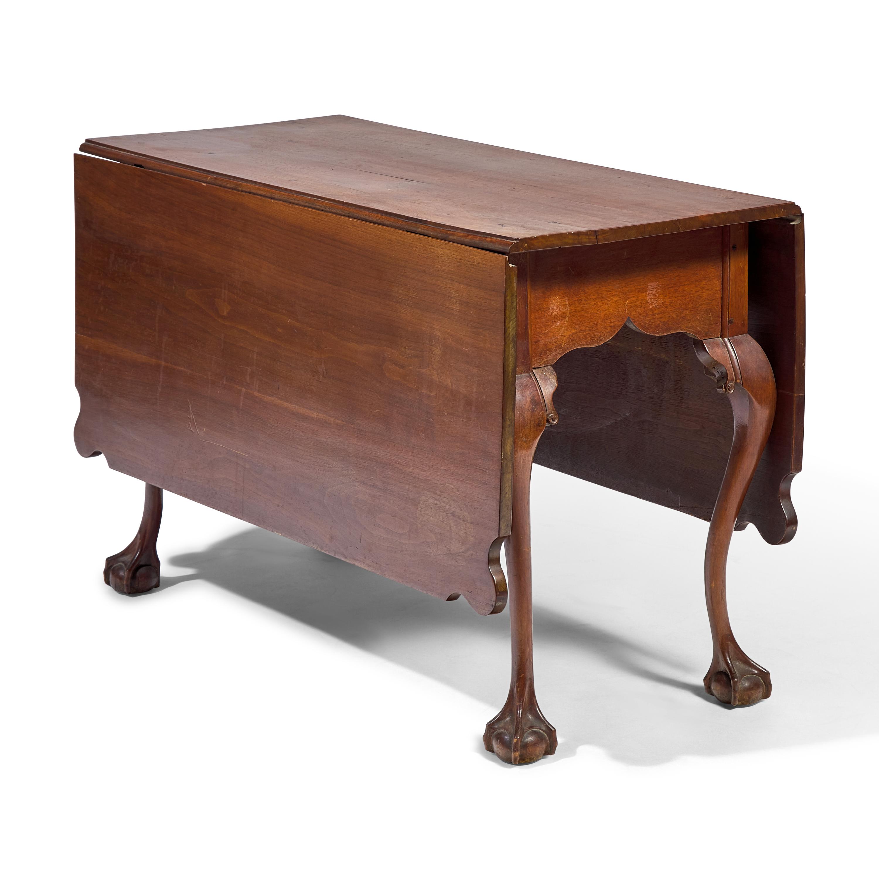 A Chippendale Carved Walnut Drop-Leaf Dining Table
