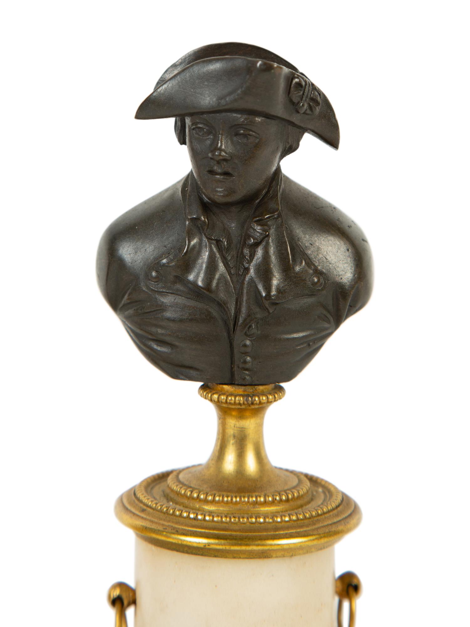 A Pair of French Bronze and Marble Small Busts