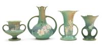 Four Roseville Cosmos Pottery Vases Height of tallest 7 1/2 inches.