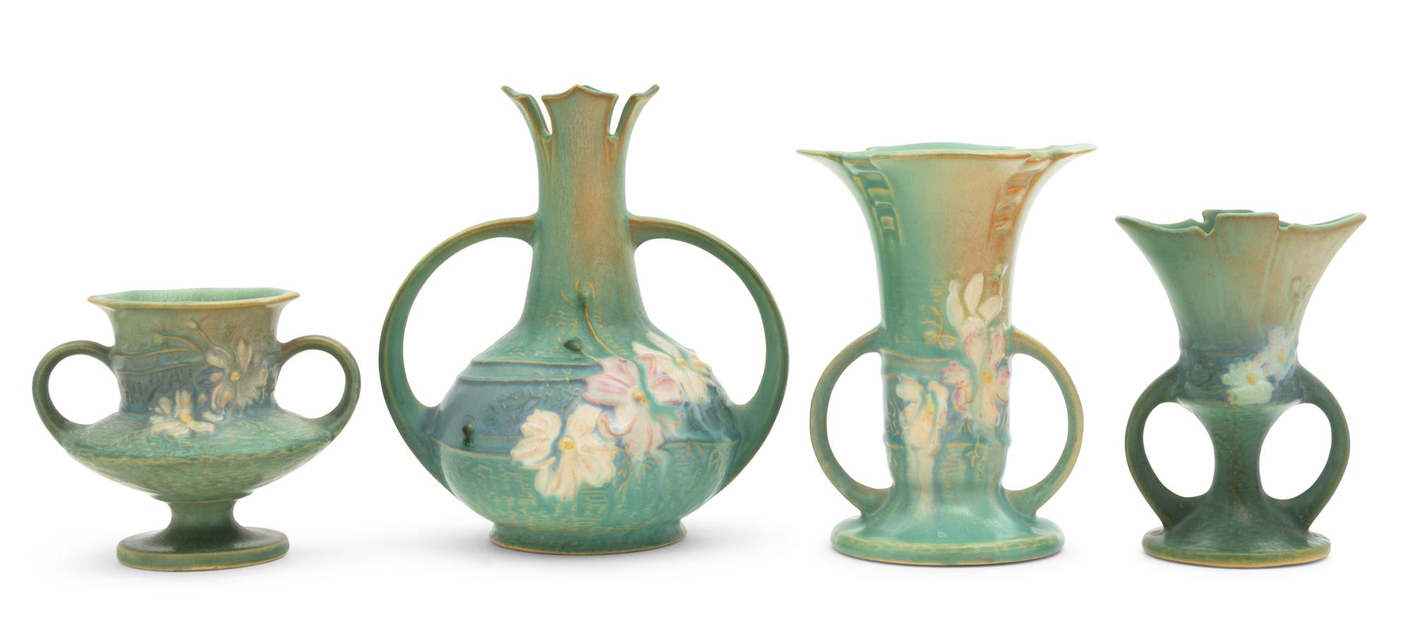 Four Roseville Cosmos Pottery Vases Height of tallest 7 1/2 inches.