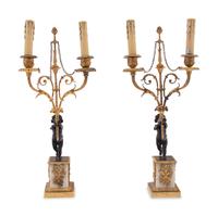 A Pair of French Gilt Metal and Marble Figural Two-Light Candelabra