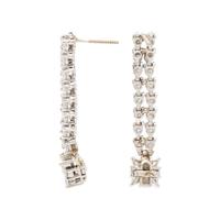DIAMOND AND WHITE GOLD FLOWER BRACELET AND EARRINGS