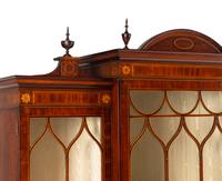 An Edwardian Inlaid Mahogany Breakfront Cabinet