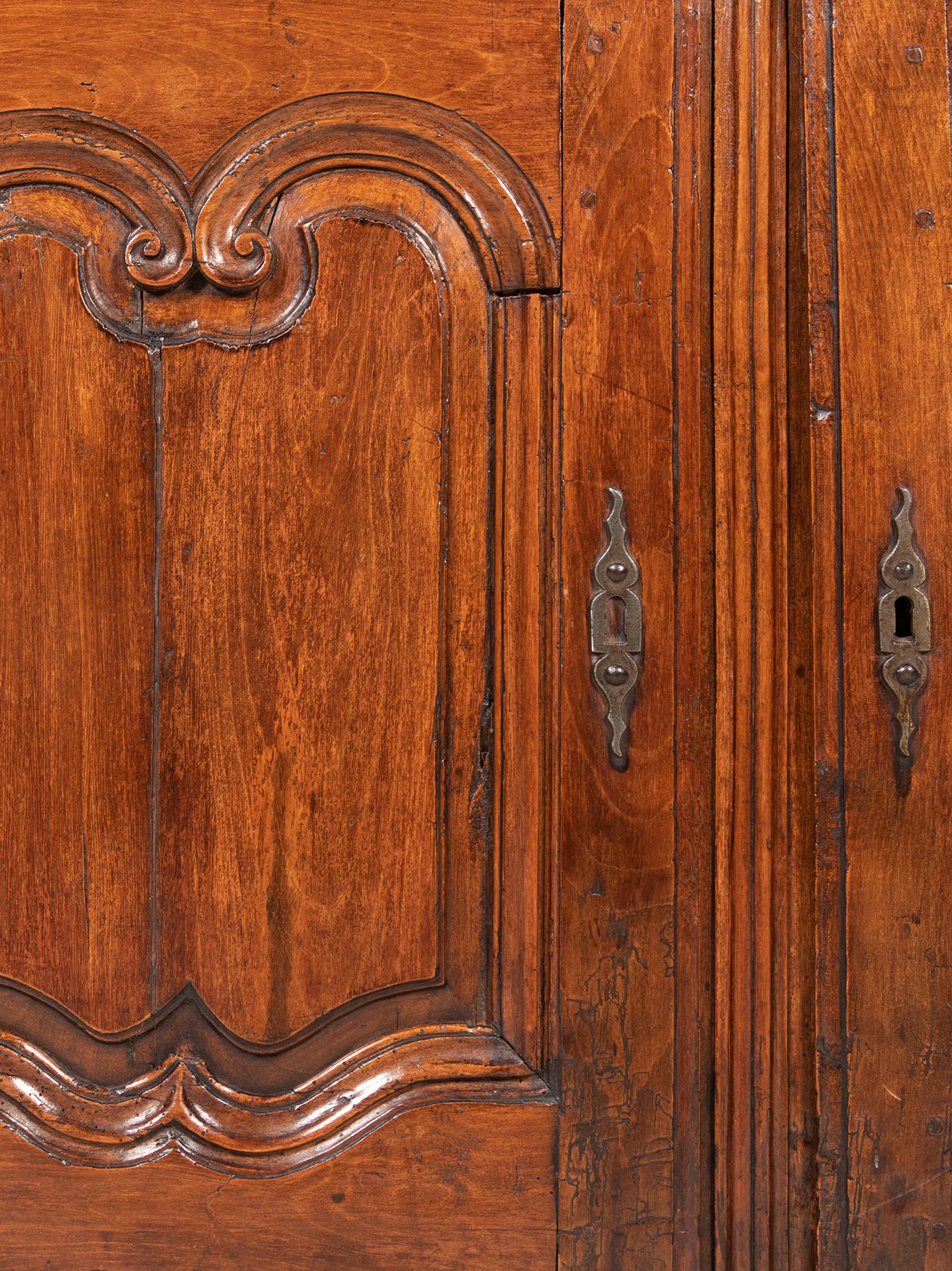 A French Provincial Carved Walnut Buffet à Deux Corps