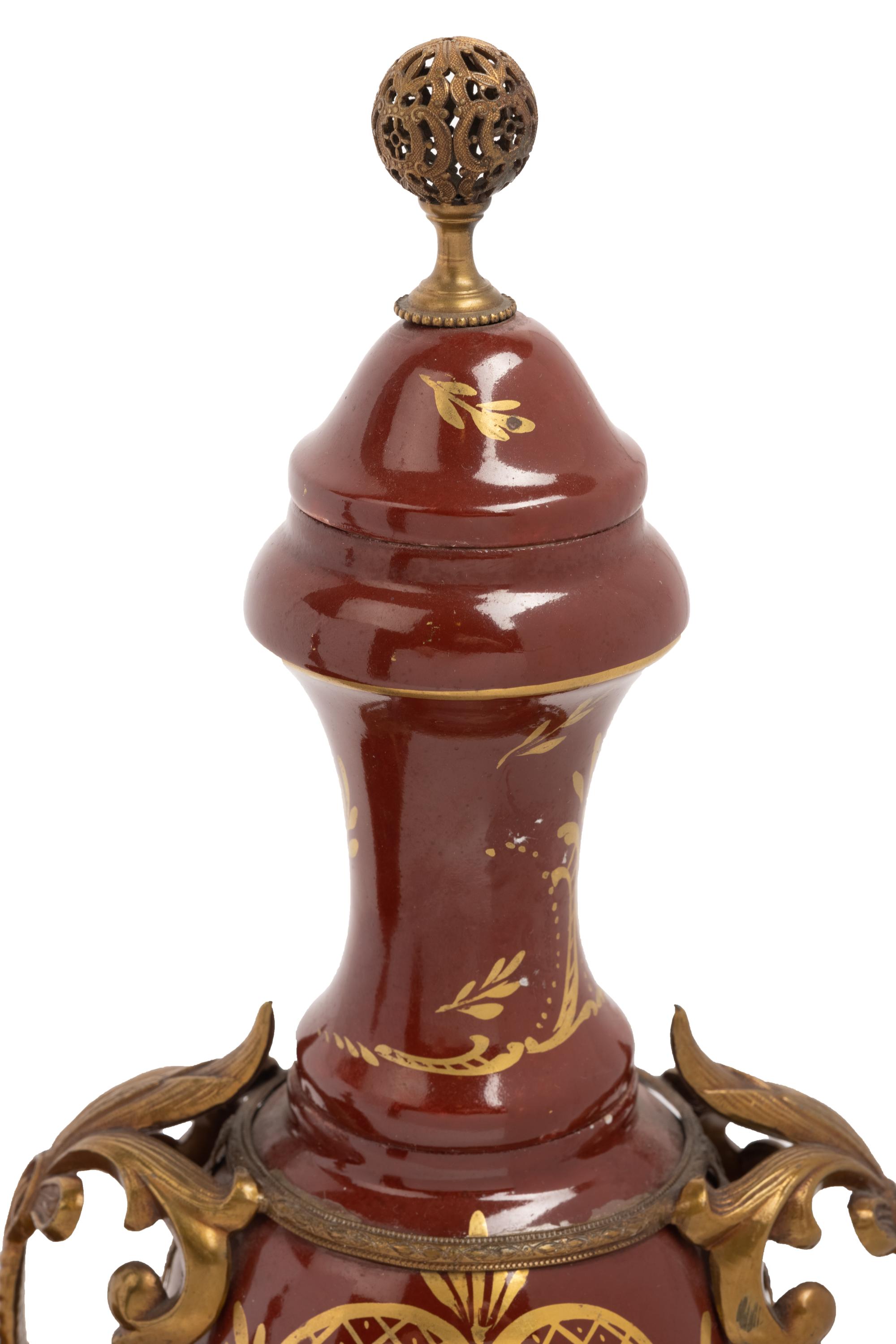 An Assembled French Gilt Metal Mounted Porcelain and Pottery Garniture
