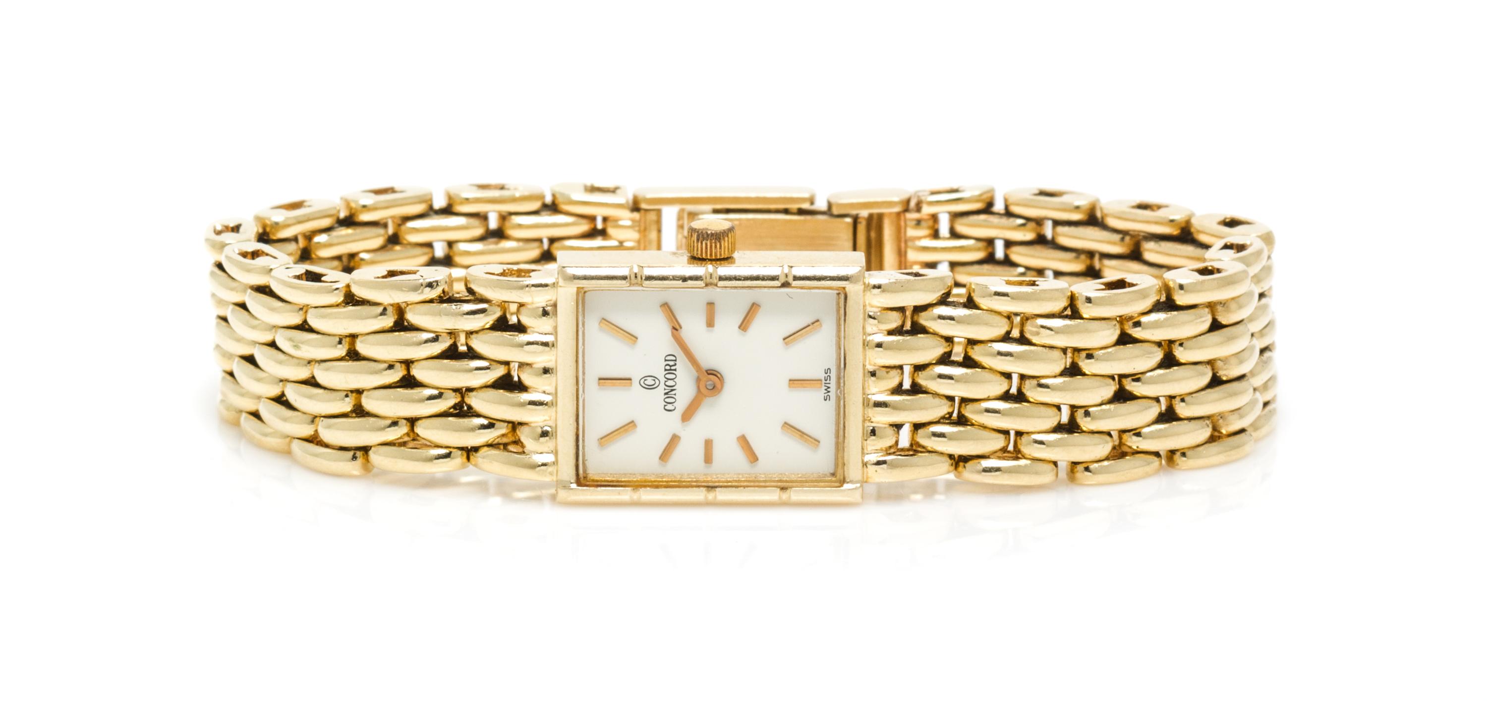 A 14 Karat Yellow Gold Wristwatch, Concord, 24.50 dwts.