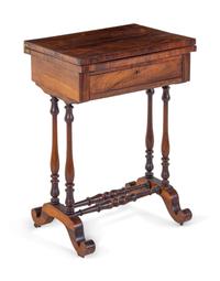A Late Regency Walnut Game Table