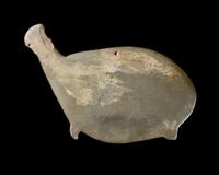 An Egyptian Greywacke Cosmetic Palette in the Form of a Hippopotamus