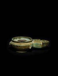 A Roman Bronze Oil Lamp