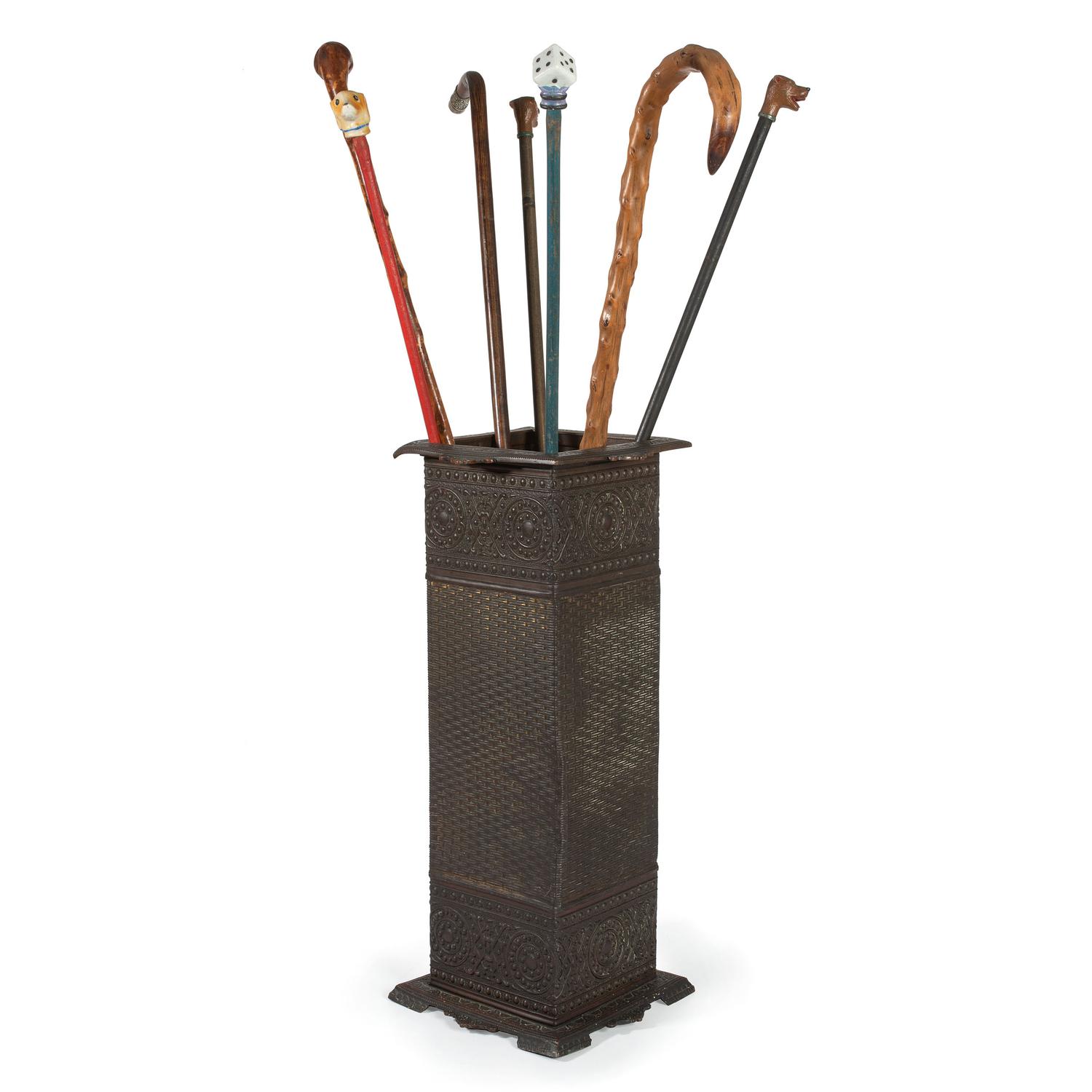 Seven Walking Sticks and a Cast Metal Umbrella Stand