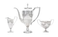 An American Silver Three-Piece Demitasse Set, Lebkuecher & Co., Newark, NJ, Circa 1900, comprising a teapot, creamer and sugar bowl, al