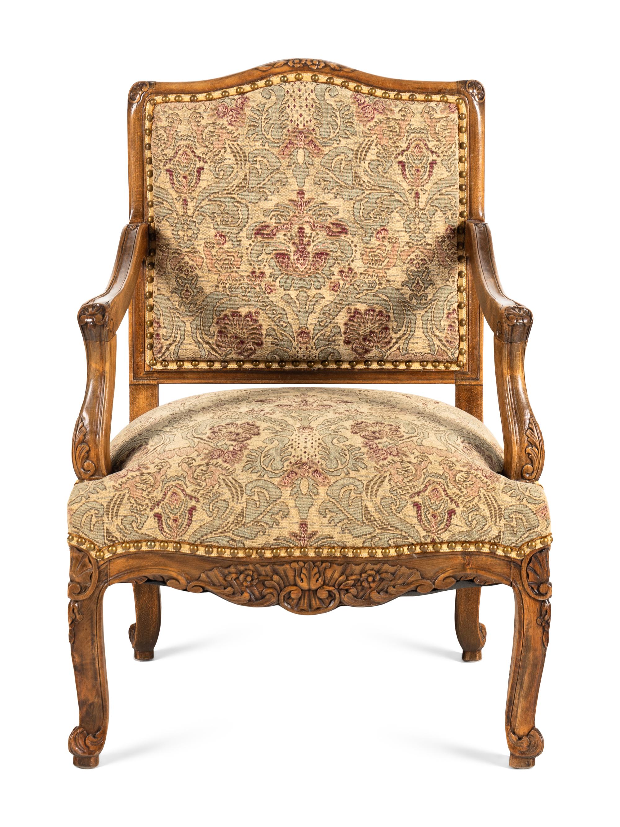 A Louis XV Style Walnut Fauteuil