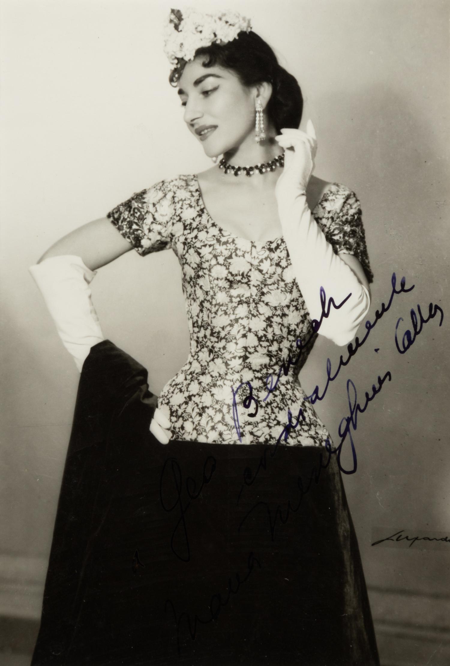 CALLAS, Maria (1923-1977). Black and white photographic portrait, signed (“Maria Meneghini Callas”) and additionally inscribed to Geo Beneah, n.d.