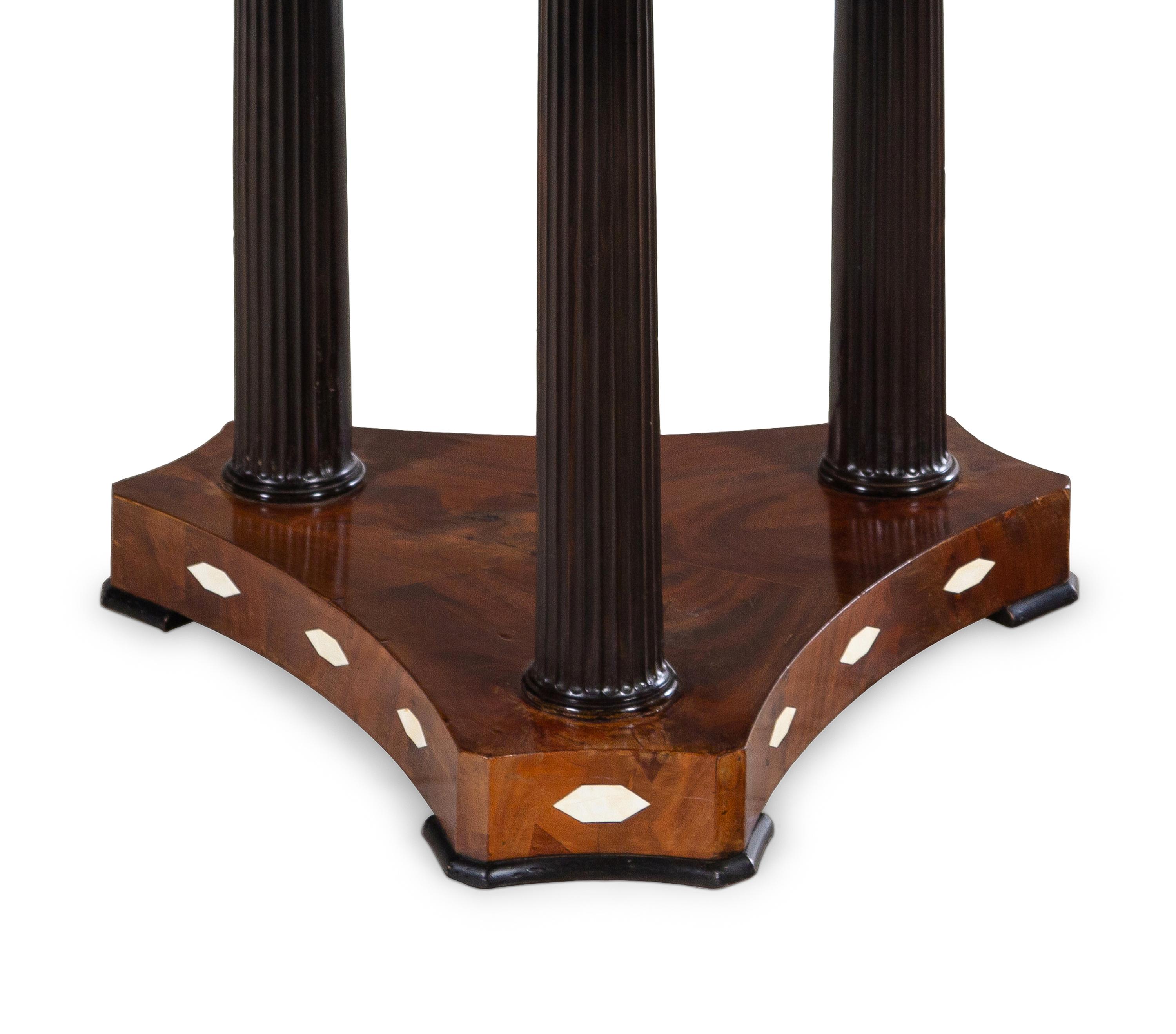 An Austrian Inlaid Mahogany and Ebony Marble-Top Center Table