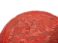A Chinese Carved Red Lacquer Circular Covered Box