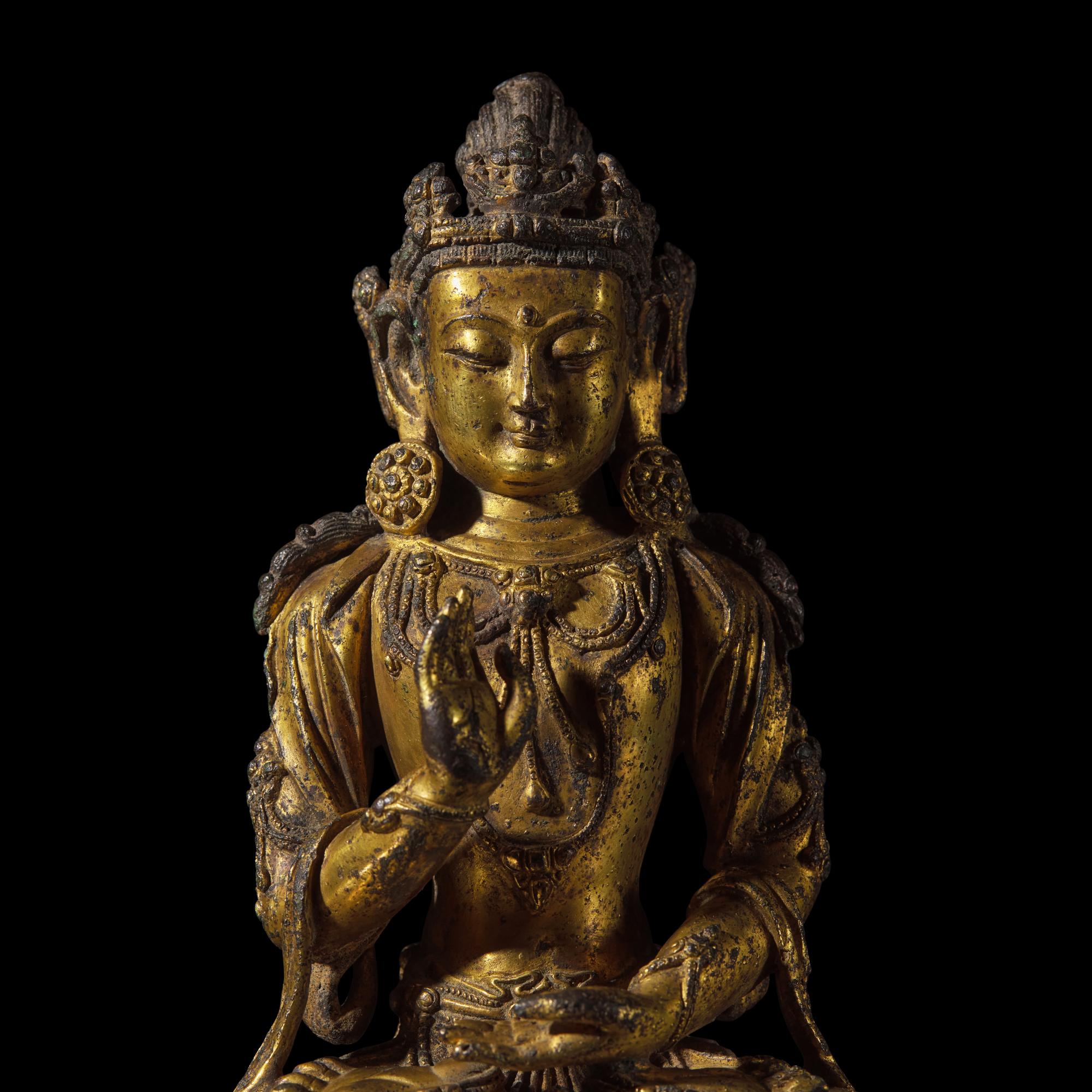 A Chinese Gilt Bronze Figure of a Seated Bodhisattva, Ming Dynasty, 15th Century 明 銅鎏金菩薩坐像