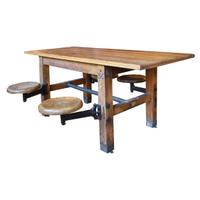 An Industrial Table with Swing Arm Seats 71" W x 29.5" D x 30" H — United States, Circa 1930