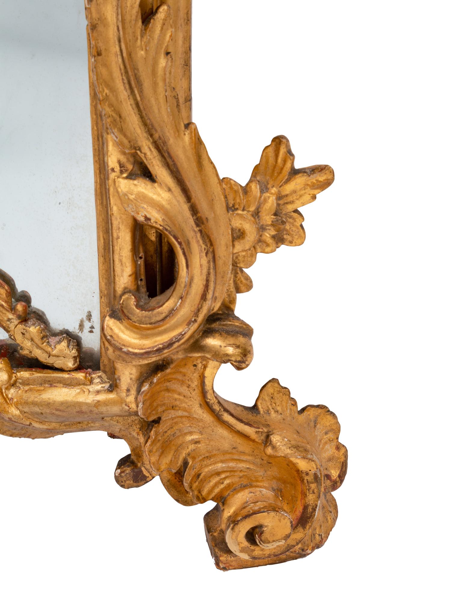An Italian Rococo Giltwood Mirror