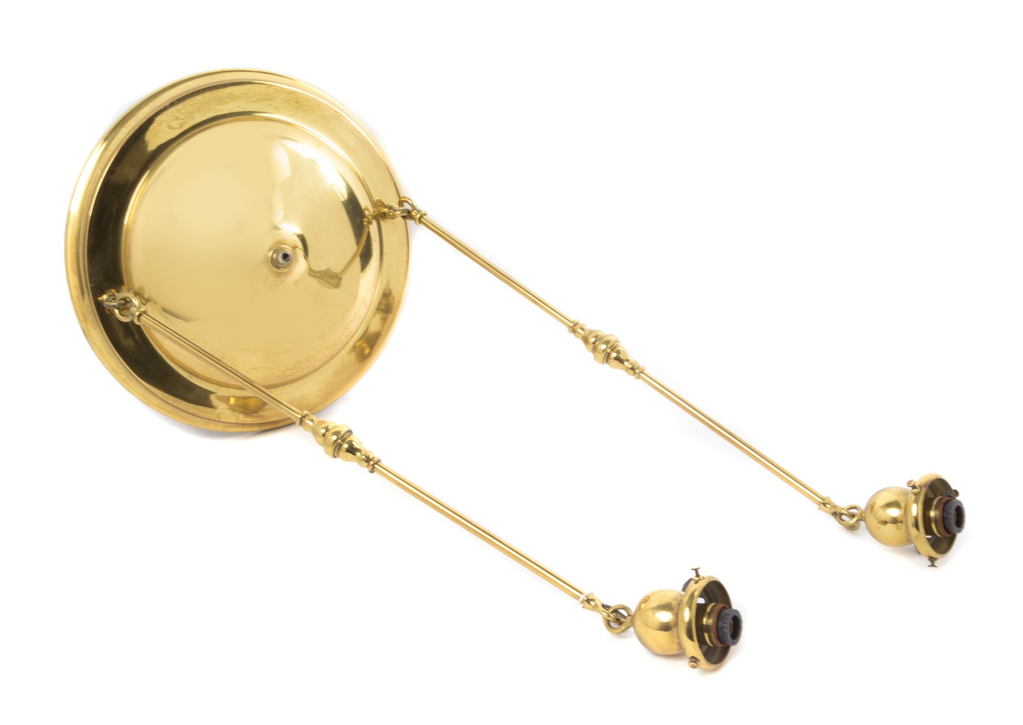 Quezal, EARLY 20TH CENTURY, a pair of glass shades, each with ribbed decoration, together with a brass two-light fixture