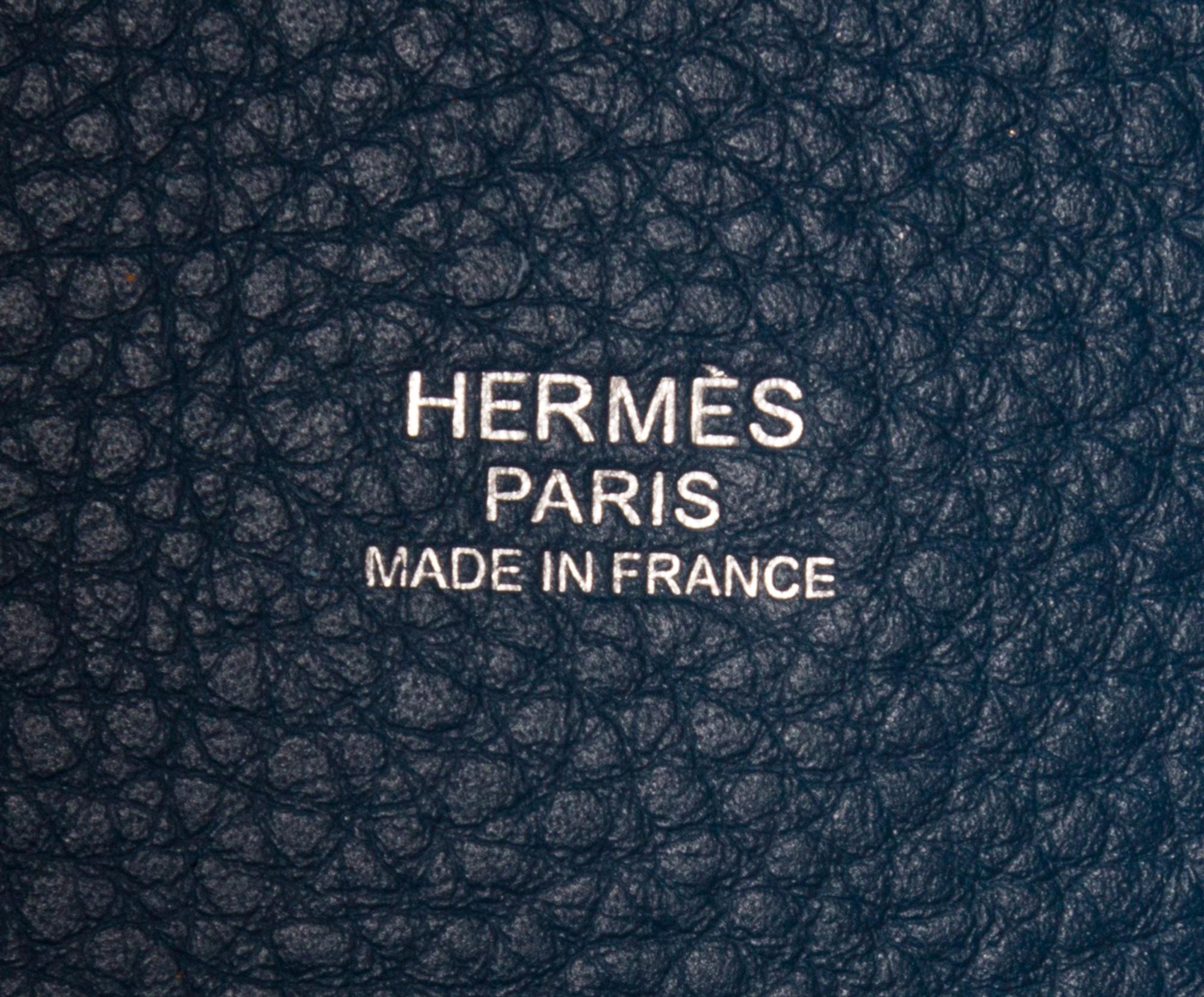 An Hermes Rouge Casaque and Bleu Taurillon Clemence Picotin Lock GM Handbag, 10.5" x 10.5" x 8.5".
