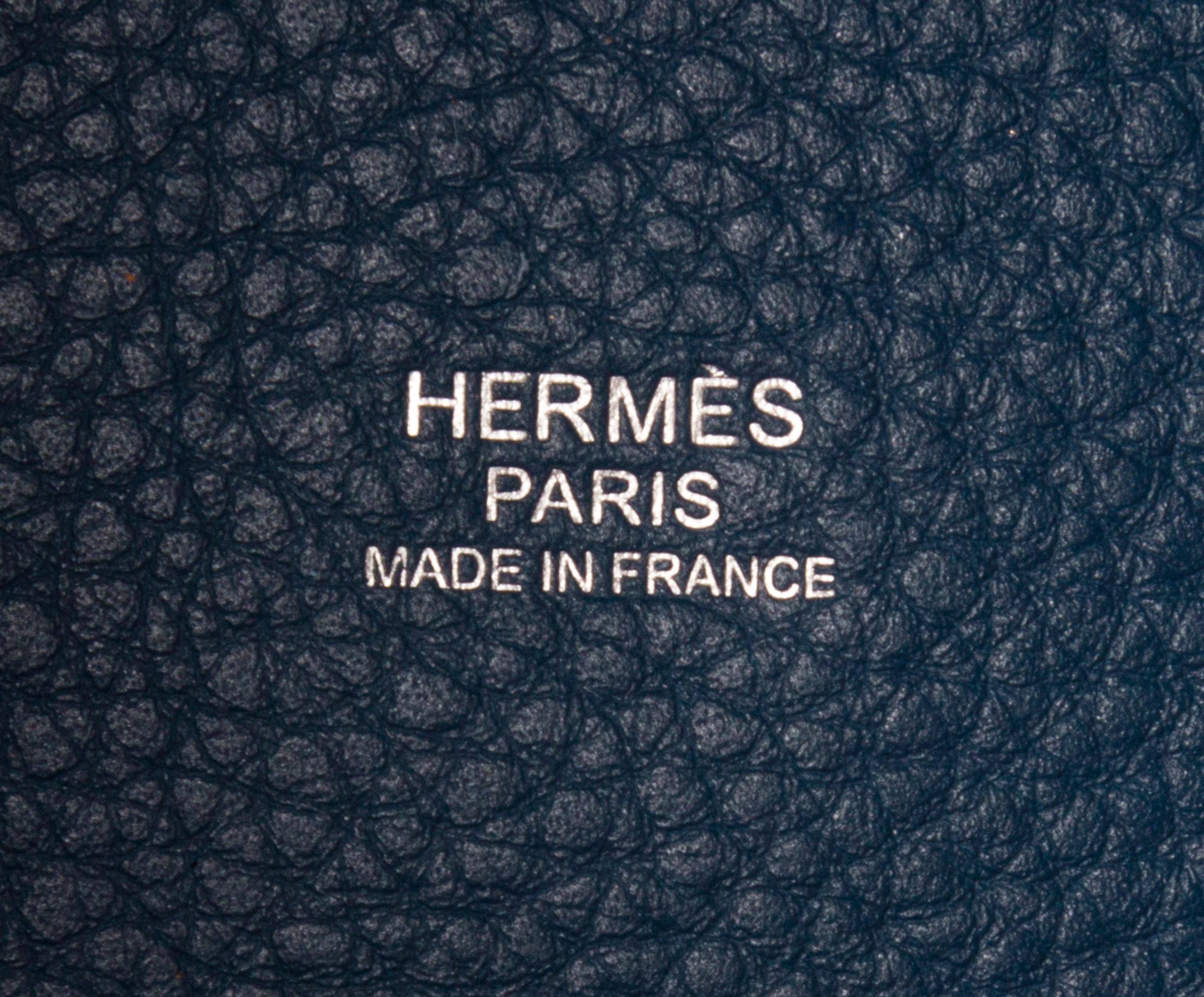 An Hermes Rouge Casaque and Bleu Taurillon Clemence Picotin Lock GM Handbag, 10.5" x 10.5" x 8.5".