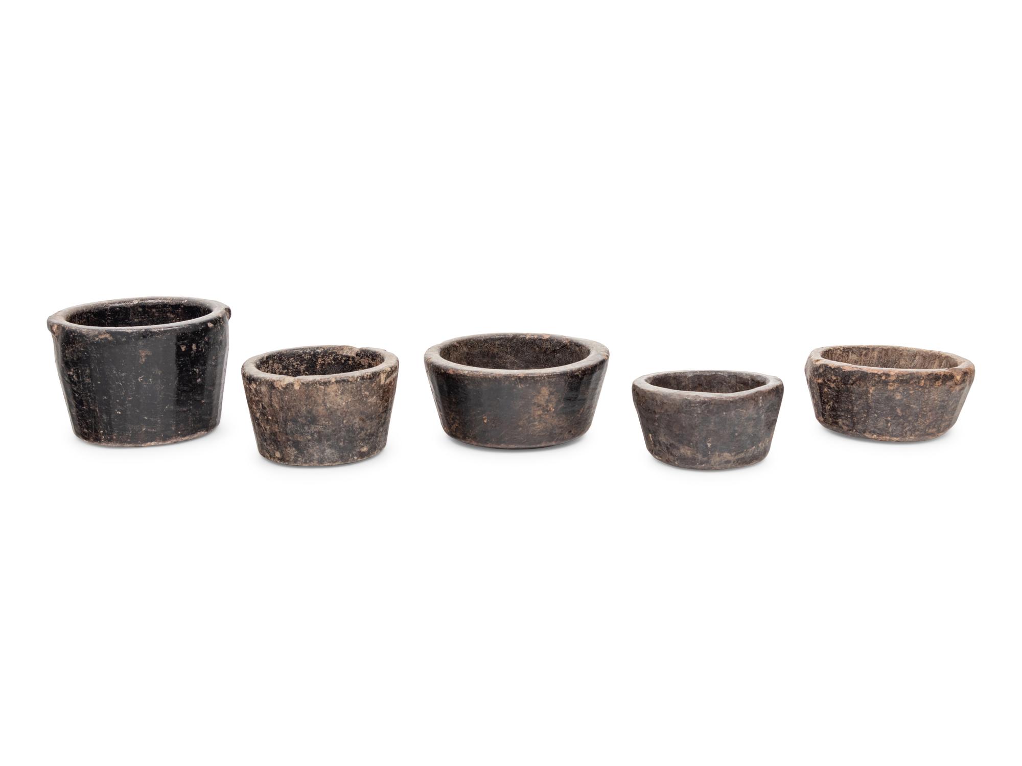 A Group of Five Carved Bowls and a Table Box