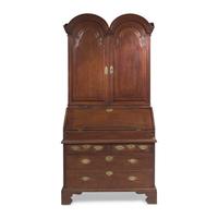 A Queen Anne Carved Oak Double-Dome Top Desk and Bookcase