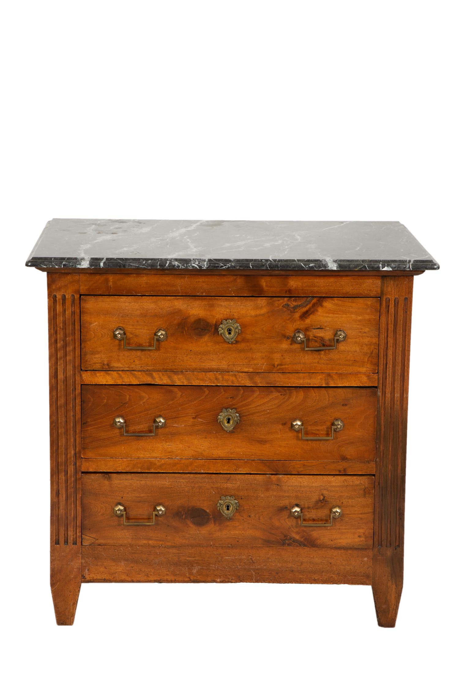 A German Walnut Four-Drawer Commode with Marble Top
