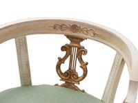 A Pair of Italian Neoclassical Style Painted and Parcel-Gilt Armchairs