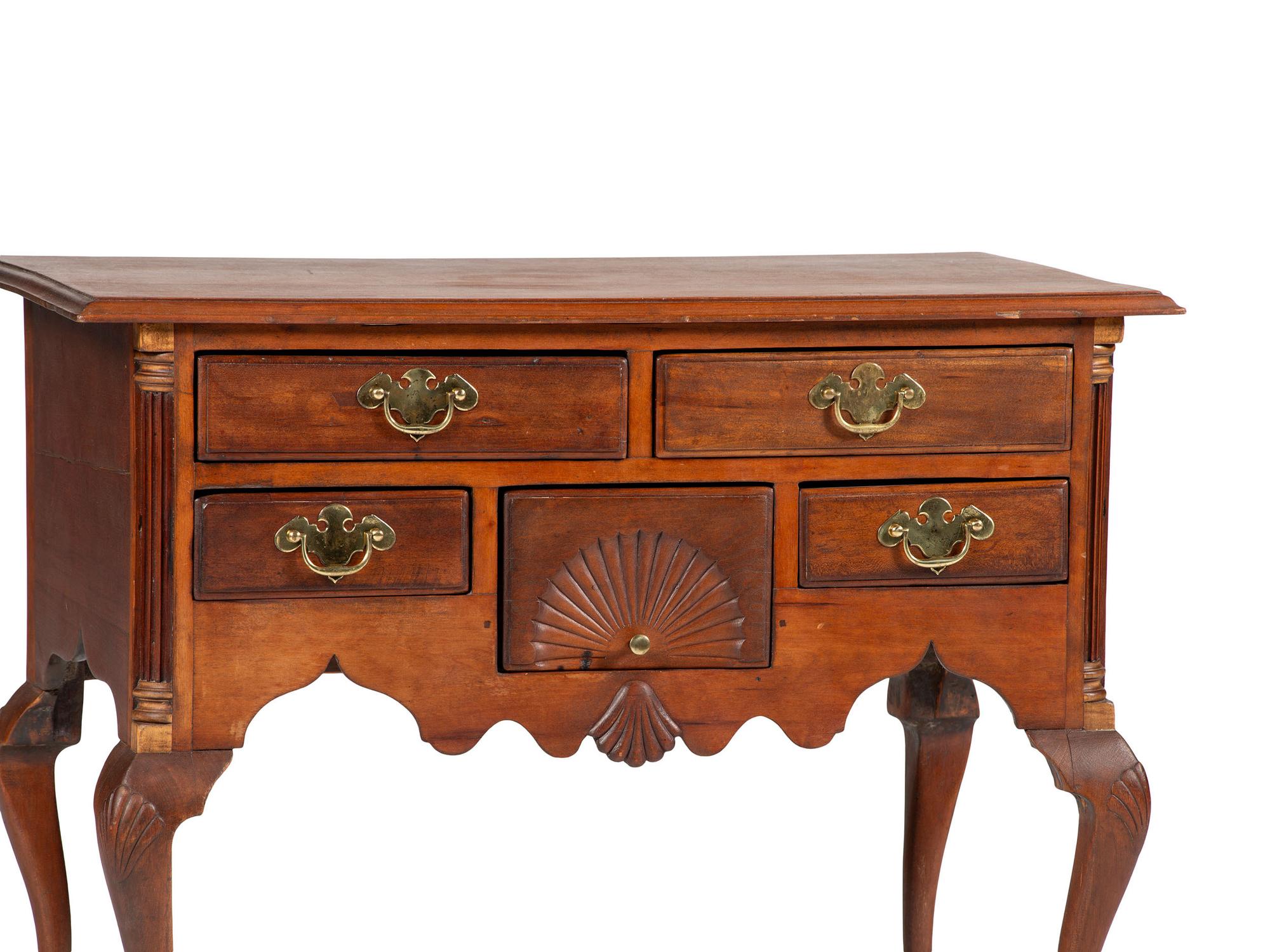 A Chippendale Shell and Fan Carved Cherrywood Ball and Claw Foot Dressing Table