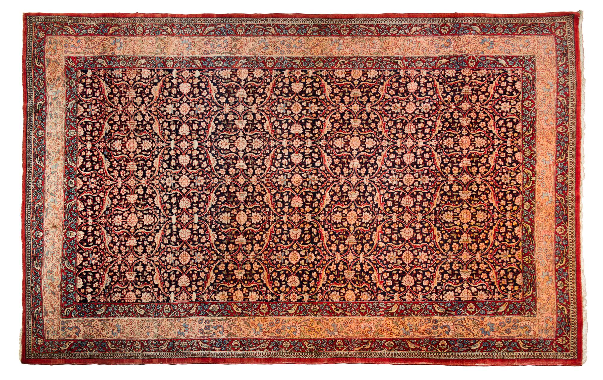 A Lavar Kirman Wool Rug 10 feet 3 inches x 6 feet 9 inches. — 19TH/20TH CENTURY