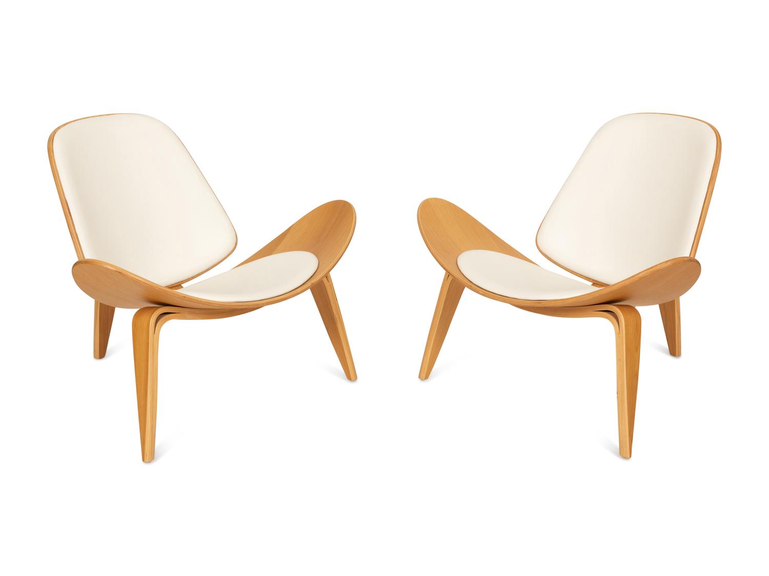 A Pair of Italian Walnut and Leather Tripod Chairs