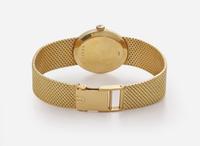 An 18K Yellow Gold Ladies Universal Geneve Watch